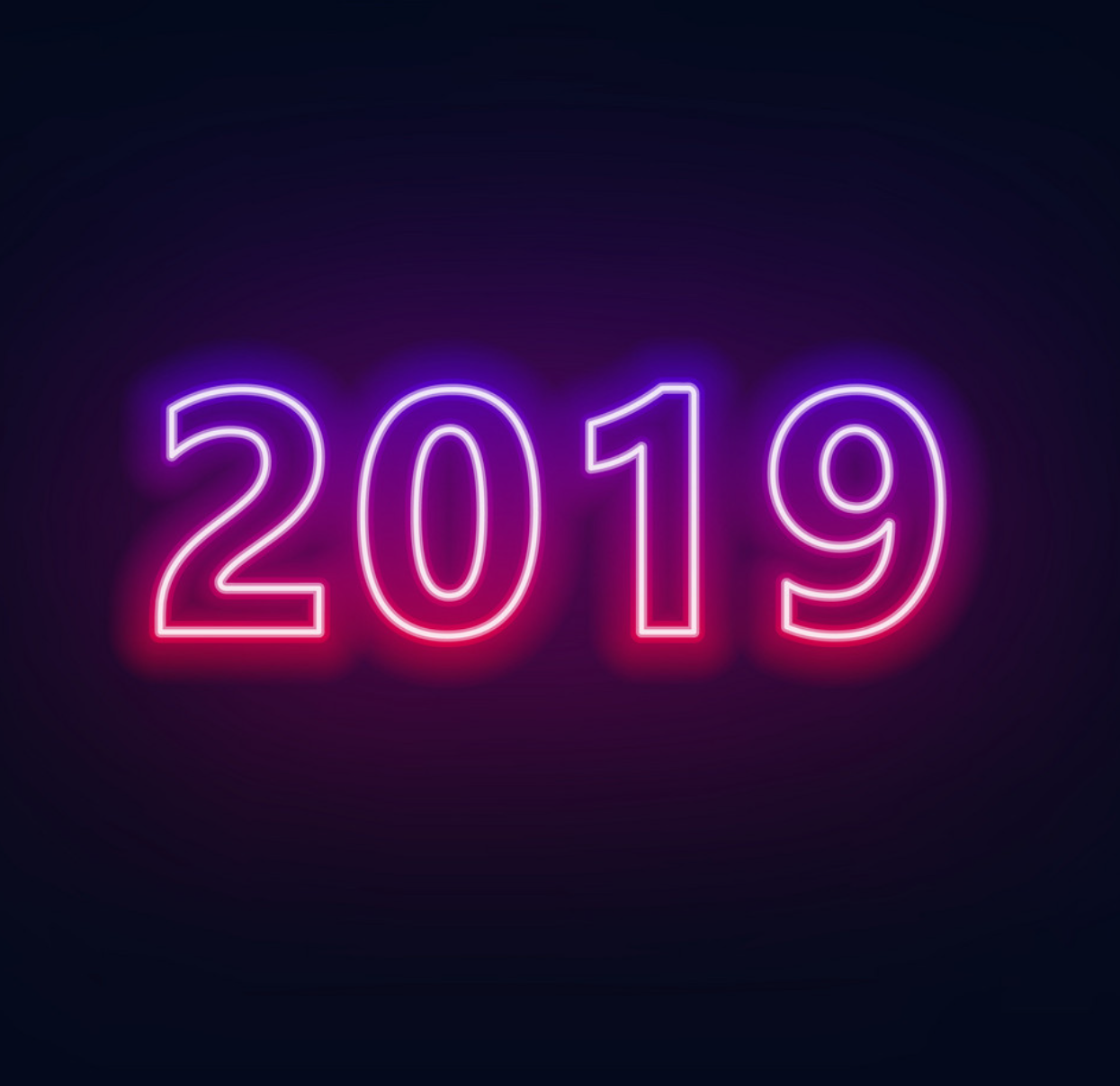 2019 in neon pink and purple on a black background.