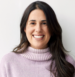 Professional headshot photograph of Ari Magalhaes.