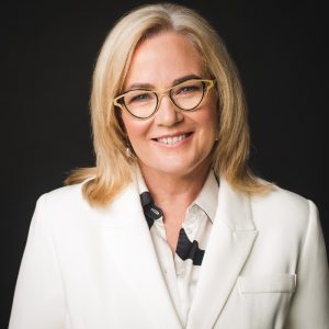 Professional headshot photograph of Moira Junge.