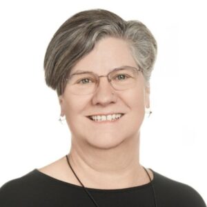 Professional headshot photograph of Sue West.