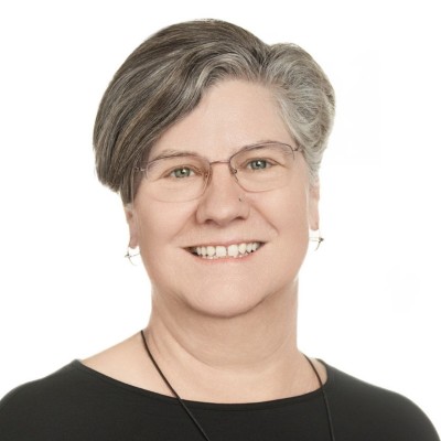 Professional headshot photograph of Sue West.