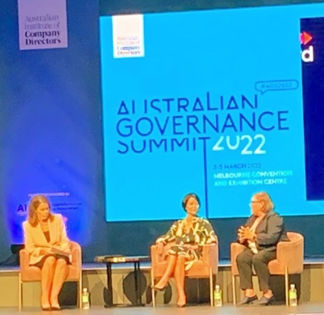 A panel of women speak on stage at the AICD summit 2022.